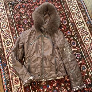 A diamond in the snow ski jacket with mink collar